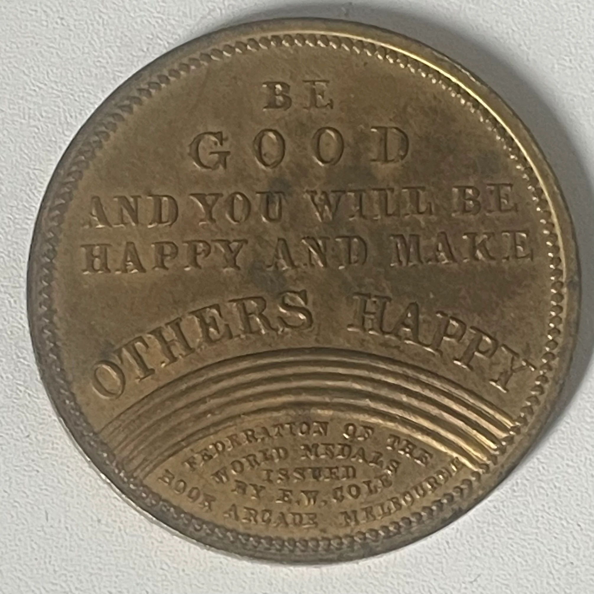 Australia 1890s E. W. COLE BOOK ARCADE MELBOURNE TOKEN "BE GOOD AND YOU WILL BE HAPPY"